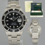 Coffret de montre Rolex Submariner Date 16610 en acier noir de 40 mm, état neuf de 2005